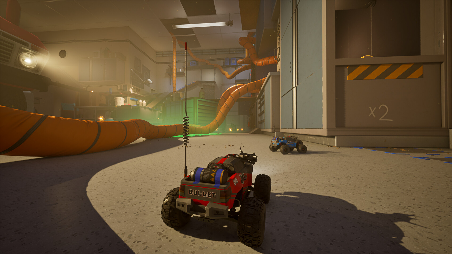 Red and blue RC cars together in the WheelMates laboratory